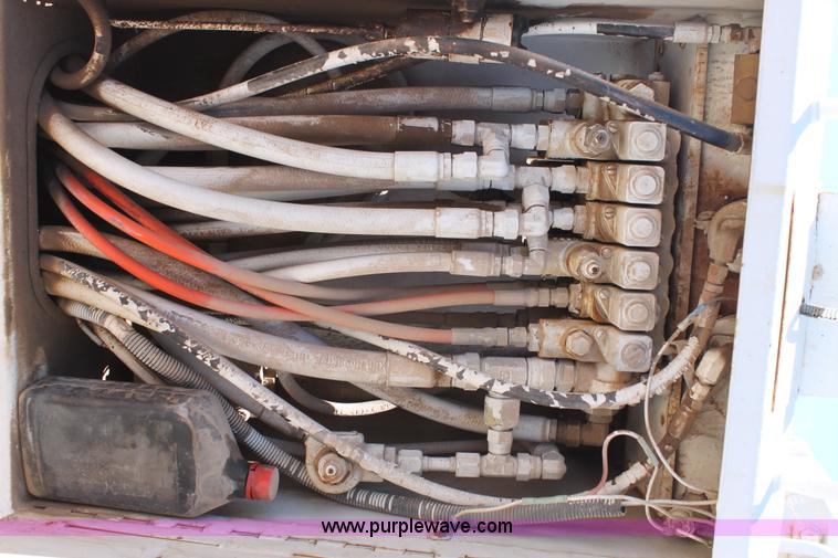 image for item L4284 1999 International 4900 digger derrick truck