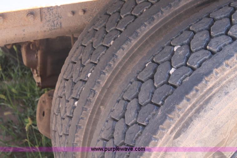 image for item L4284 1999 International 4900 digger derrick truck