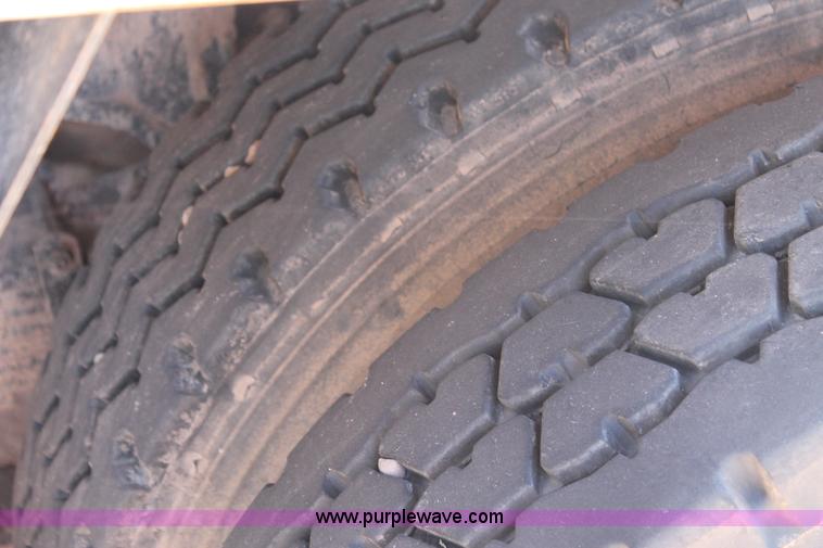 image for item L4284 1999 International 4900 digger derrick truck