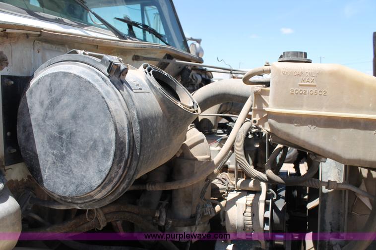 image for item L4284 1999 International 4900 digger derrick truck