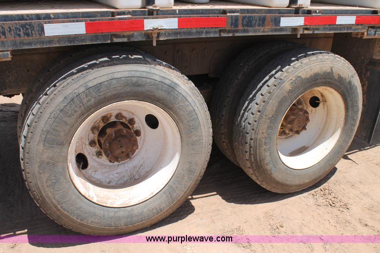 image for item L4288 1996 International 4900 flatbed truck