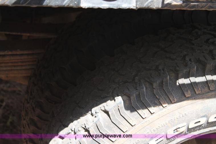 image for item L4299 2012 GMC Sierra 3500HD Crew Cab flatbed utility truck