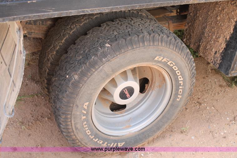 image for item L4299 2012 GMC Sierra 3500HD Crew Cab flatbed utility truck