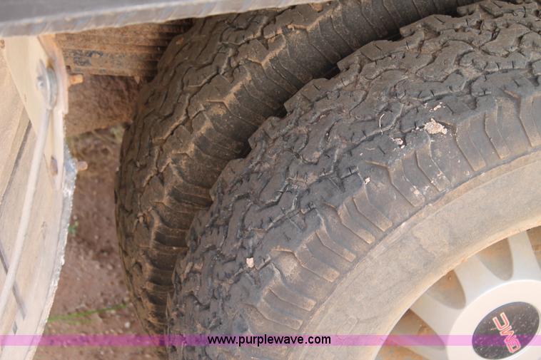 image for item L4299 2012 GMC Sierra 3500HD Crew Cab flatbed utility truck