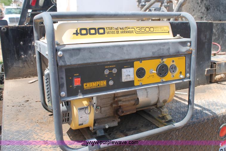 image for item L4299 2012 GMC Sierra 3500HD Crew Cab flatbed utility truck