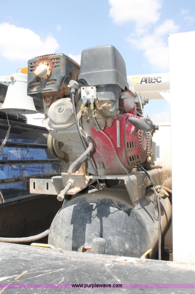 image for item L4299 2012 GMC Sierra 3500HD Crew Cab flatbed utility truck