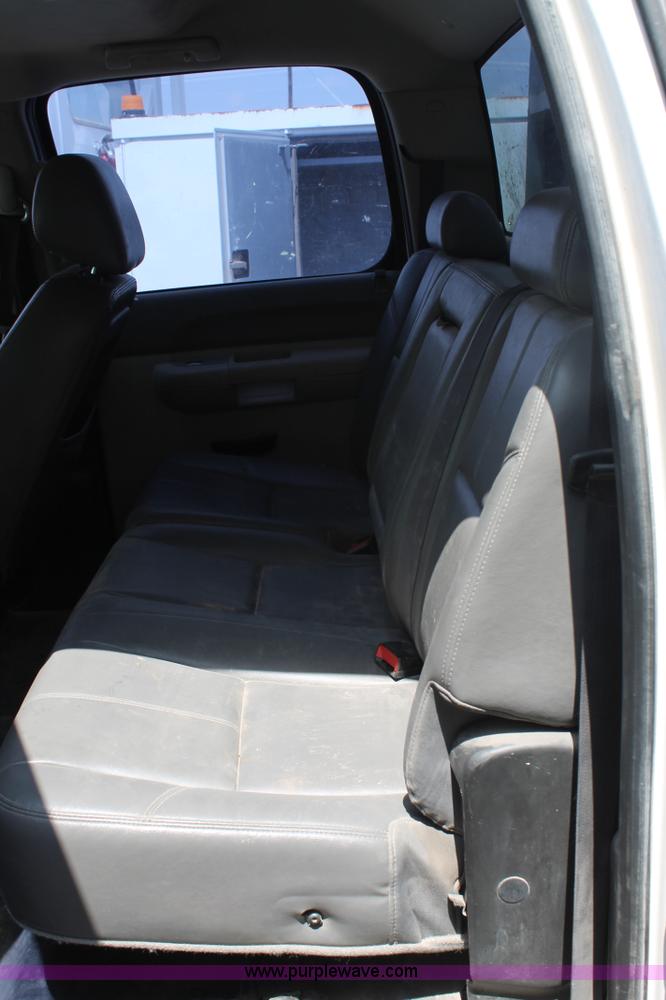 image for item L4299 2012 GMC Sierra 3500HD Crew Cab flatbed utility truck