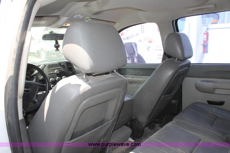 image for item L4299 2012 GMC Sierra 3500HD Crew Cab flatbed utility truck