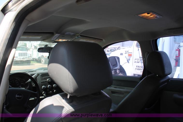 image for item L4299 2012 GMC Sierra 3500HD Crew Cab flatbed utility truck