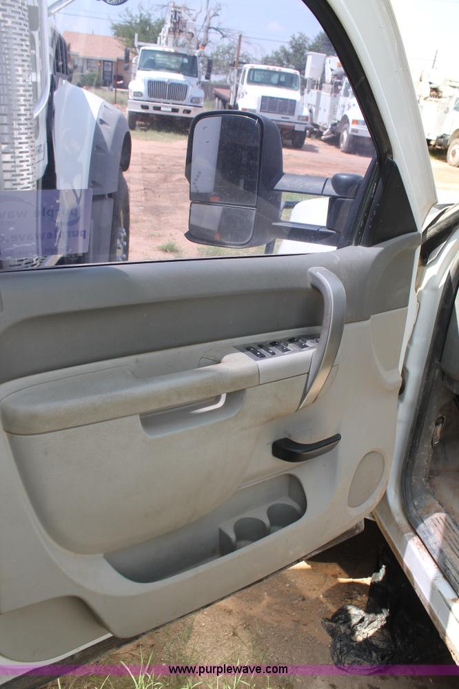 image for item L4299 2012 GMC Sierra 3500HD Crew Cab flatbed utility truck