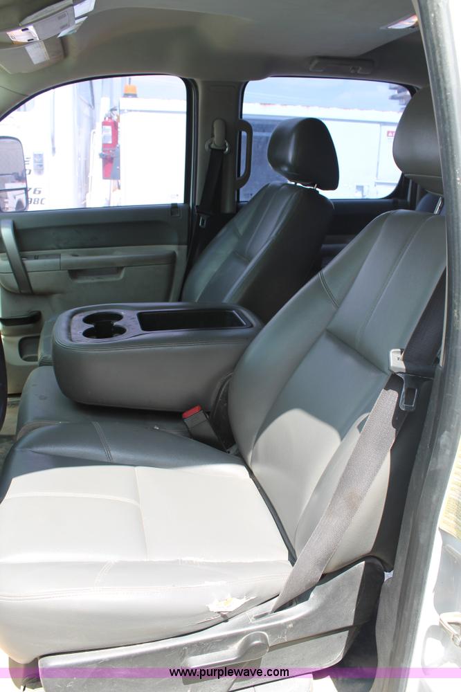 image for item L4299 2012 GMC Sierra 3500HD Crew Cab flatbed utility truck