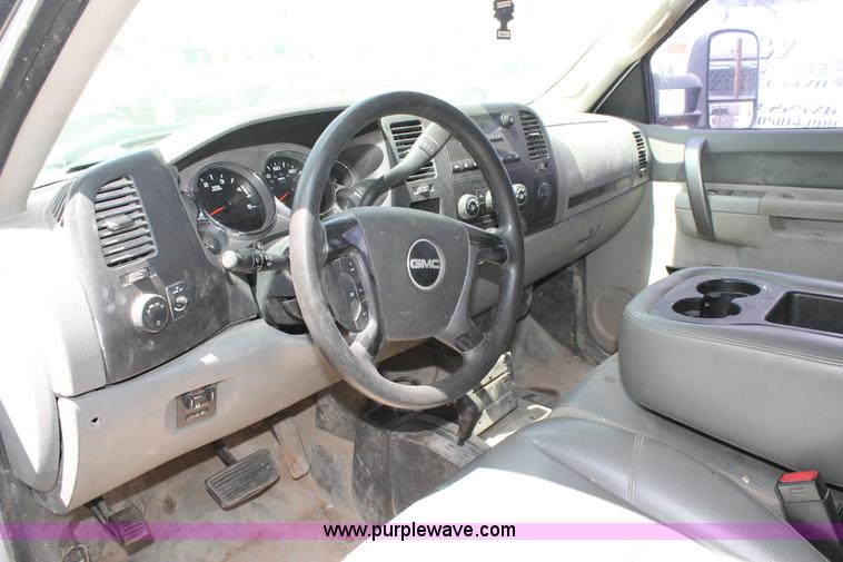 image for item L4299 2012 GMC Sierra 3500HD Crew Cab flatbed utility truck