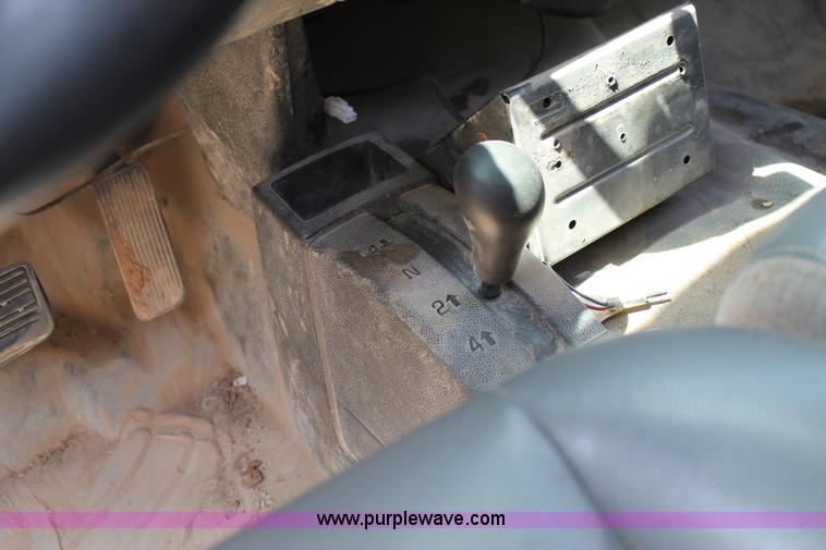 image for item L4299 2012 GMC Sierra 3500HD Crew Cab flatbed utility truck