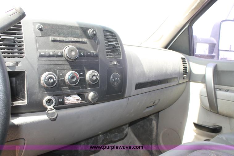 image for item L4299 2012 GMC Sierra 3500HD Crew Cab flatbed utility truck