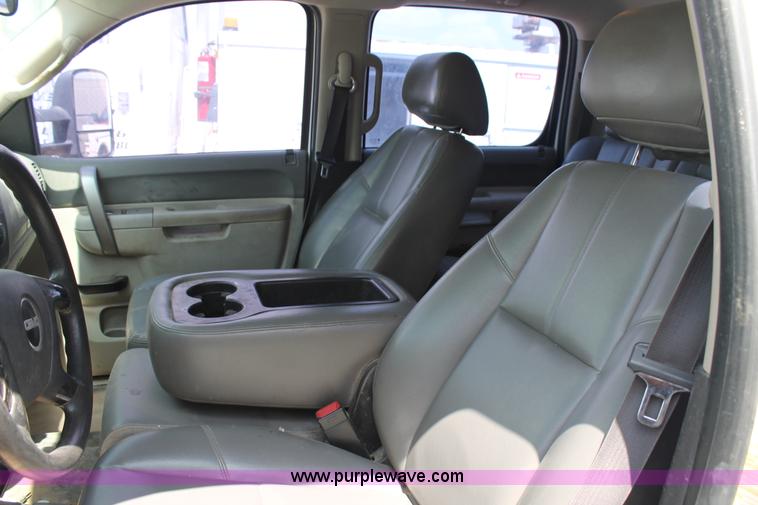 image for item L4299 2012 GMC Sierra 3500HD Crew Cab flatbed utility truck