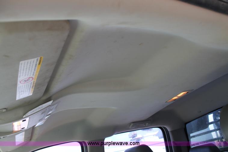 image for item L4299 2012 GMC Sierra 3500HD Crew Cab flatbed utility truck