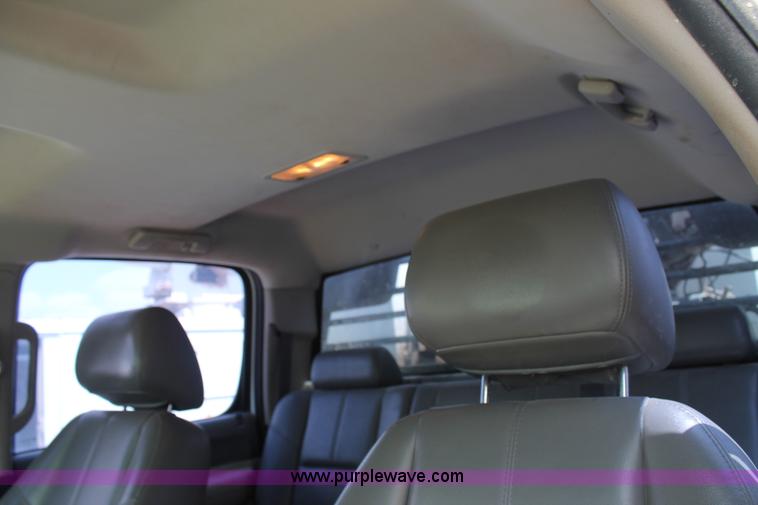 image for item L4299 2012 GMC Sierra 3500HD Crew Cab flatbed utility truck