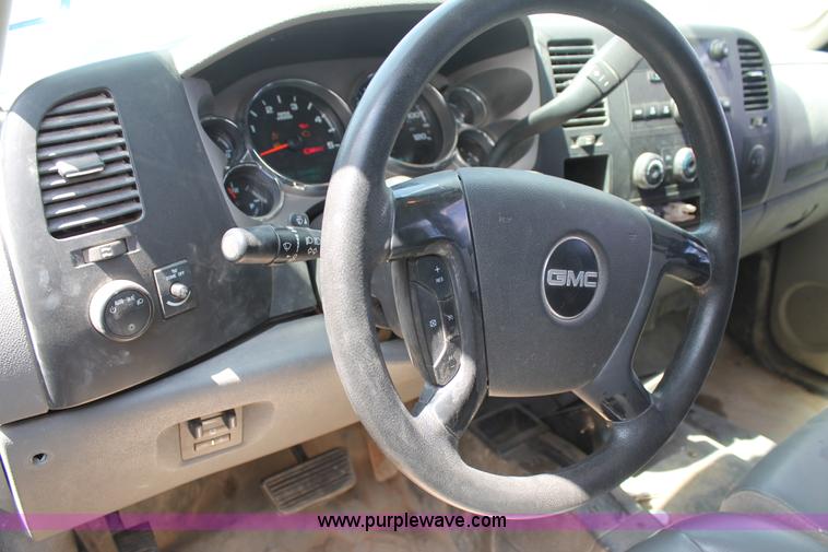 image for item L4299 2012 GMC Sierra 3500HD Crew Cab flatbed utility truck