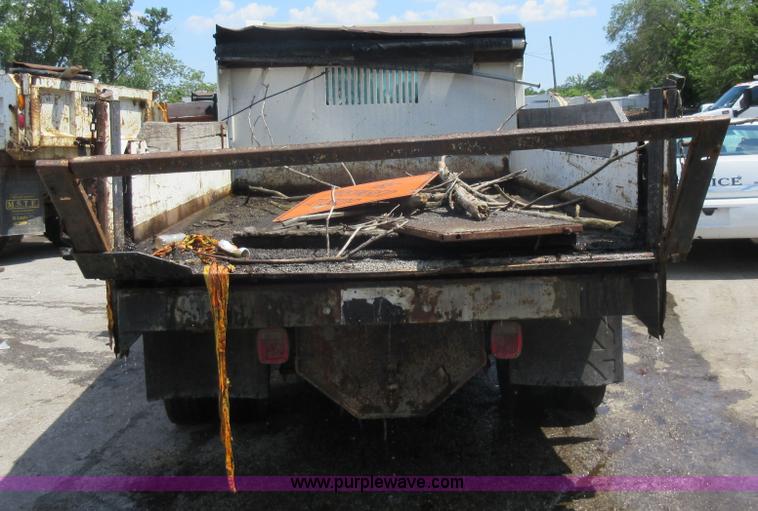 image for item G3624 2003 GMC C5 dump truck