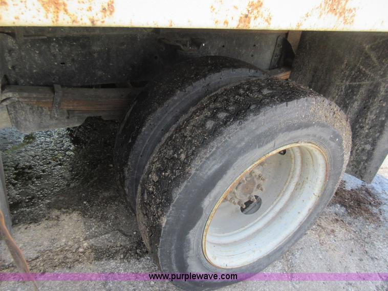 image for item G3624 2003 GMC C5 dump truck