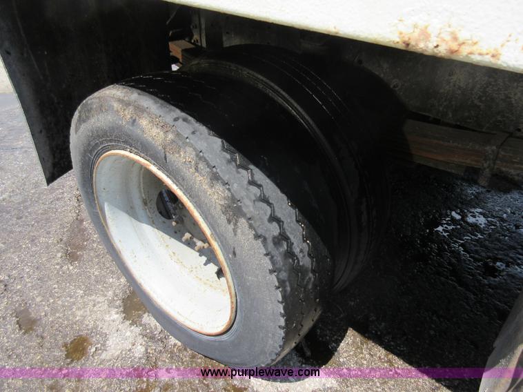 image for item G3624 2003 GMC C5 dump truck