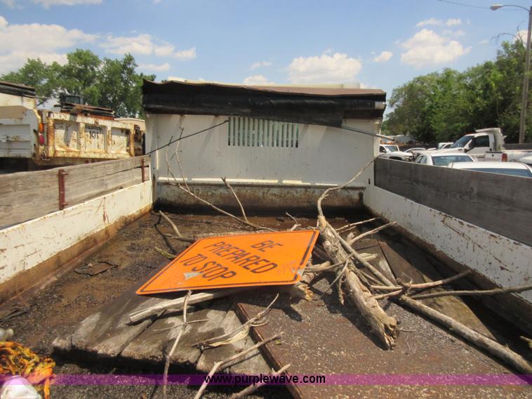 image for item G3624 2003 GMC C5 dump truck