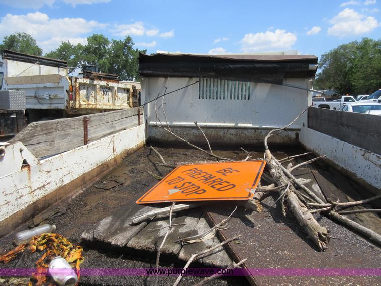 image for item G3624 2003 GMC C5 dump truck