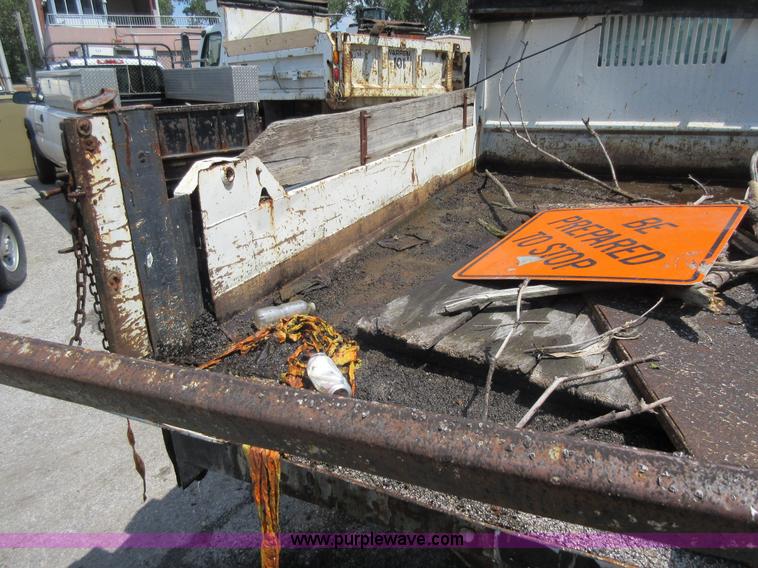 image for item G3624 2003 GMC C5 dump truck