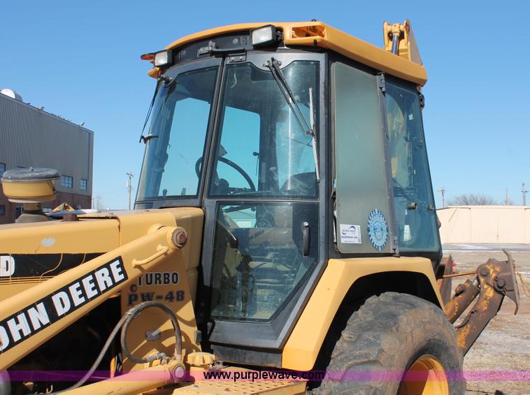 image for item H5830 1994 John Deere 310D backhoe