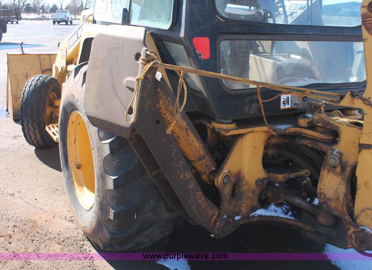image for item H5830 1994 John Deere 310D backhoe