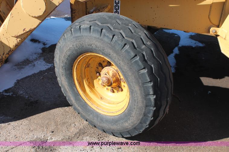 image for item H5830 1994 John Deere 310D backhoe