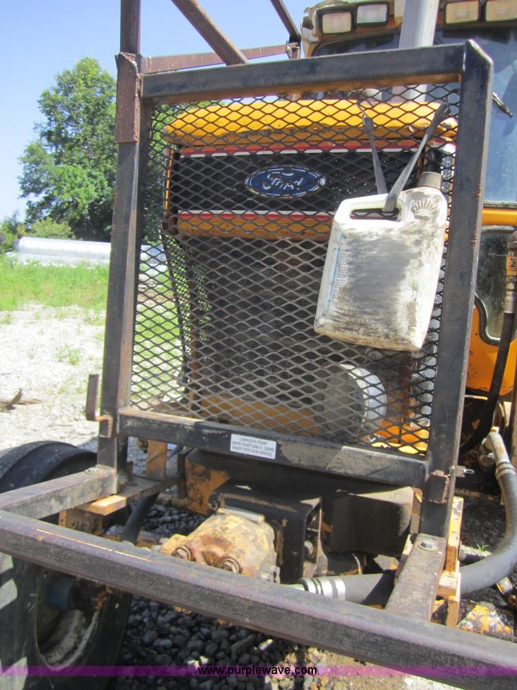 image for item I2111 1990 Ford 7710 tractor