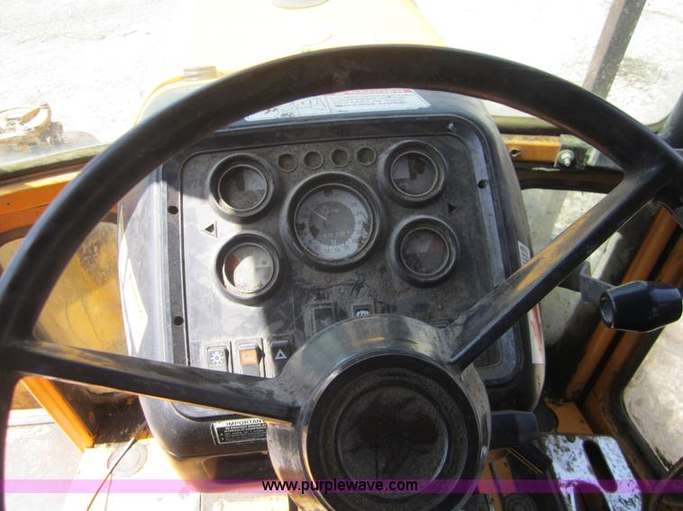 image for item I2111 1990 Ford 7710 tractor