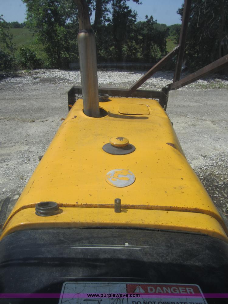 image for item I2111 1990 Ford 7710 tractor