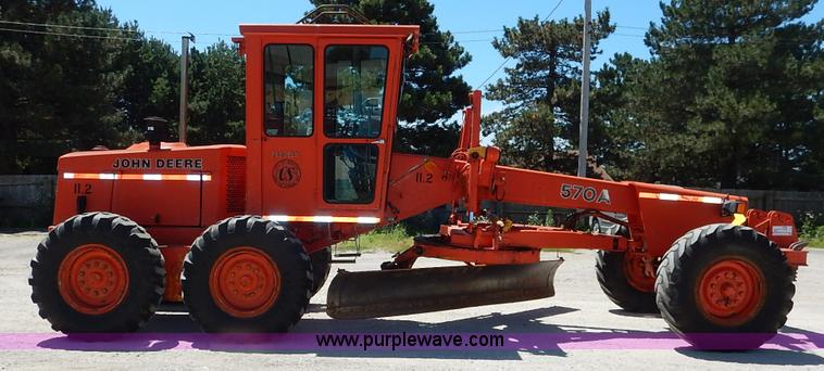 image for item J3756 1983 John Deere 570A motor grader