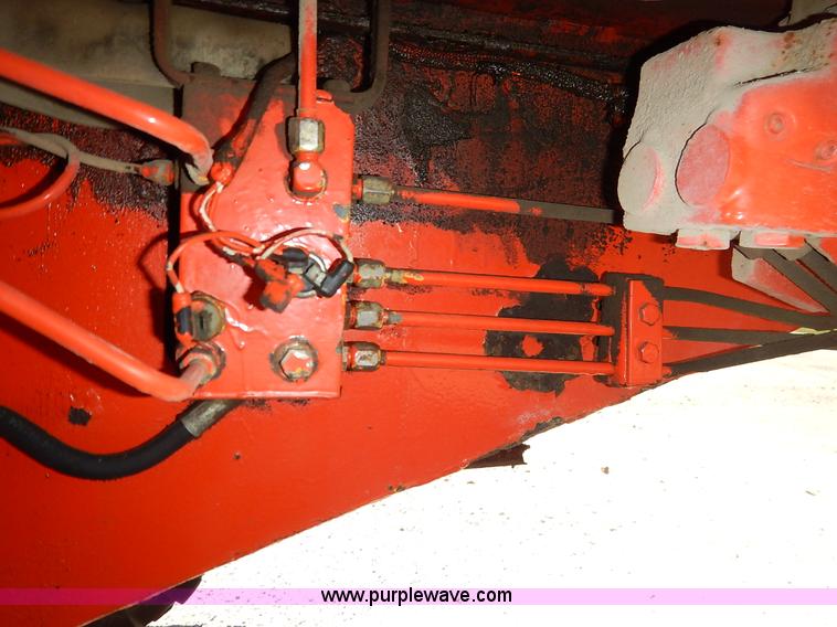 image for item J3756 1983 John Deere 570A motor grader