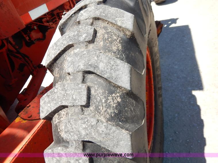 image for item J3756 1983 John Deere 570A motor grader