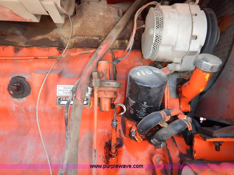 image for item J3756 1983 John Deere 570A motor grader