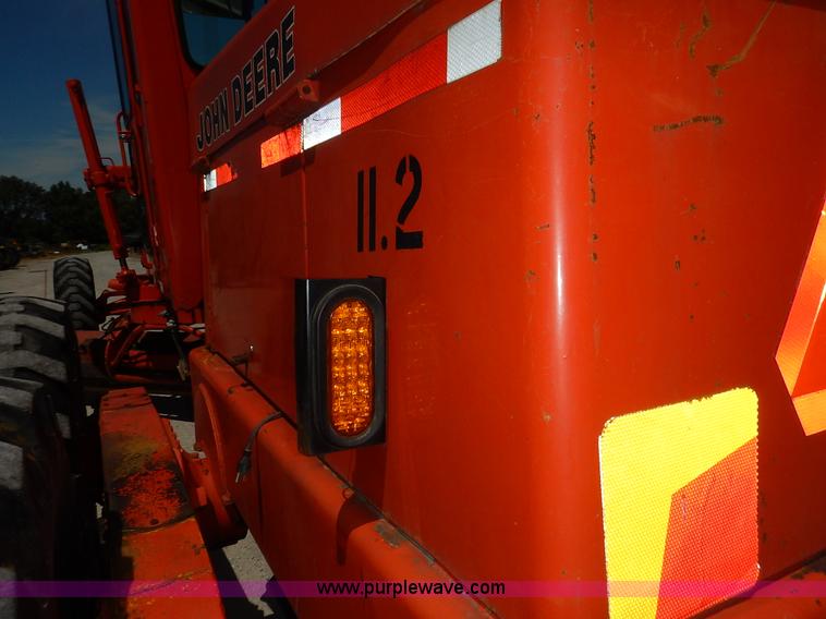 image for item J3756 1983 John Deere 570A motor grader