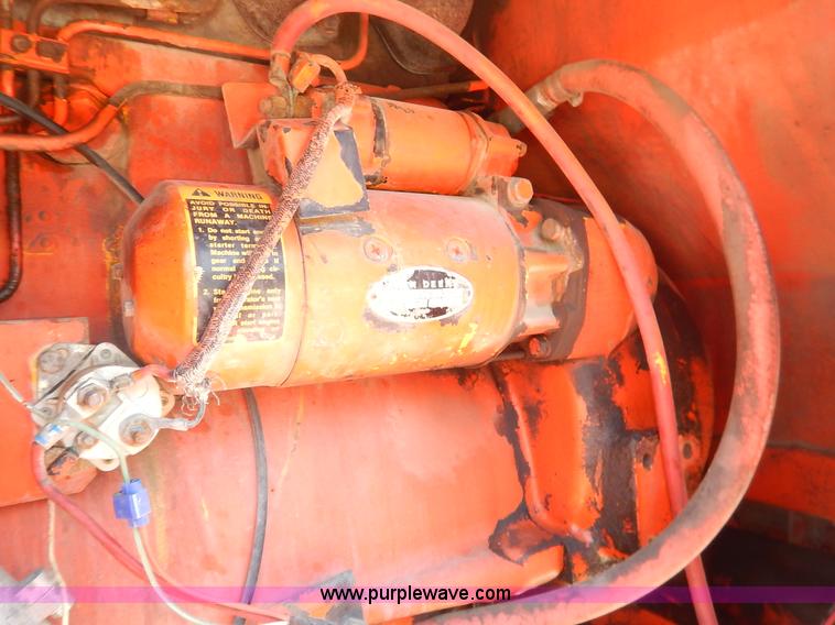 image for item J3756 1983 John Deere 570A motor grader