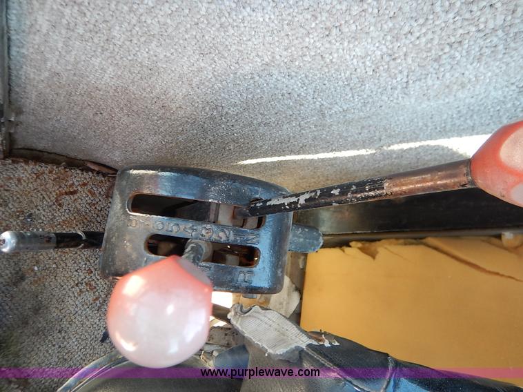 image for item J3756 1983 John Deere 570A motor grader