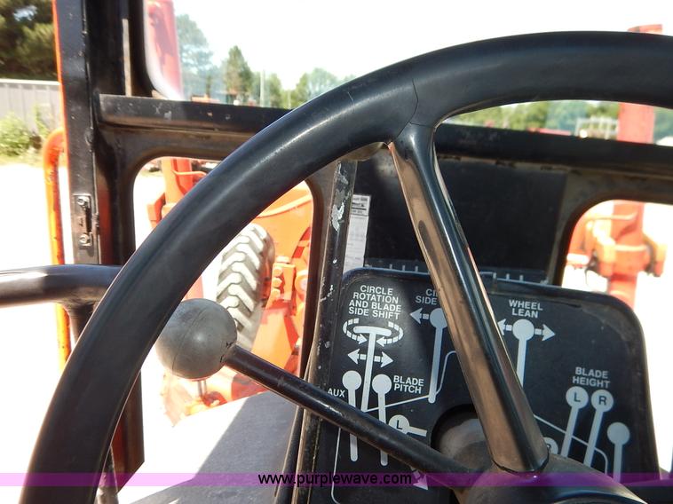 image for item J3756 1983 John Deere 570A motor grader