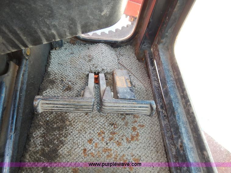 image for item J3756 1983 John Deere 570A motor grader