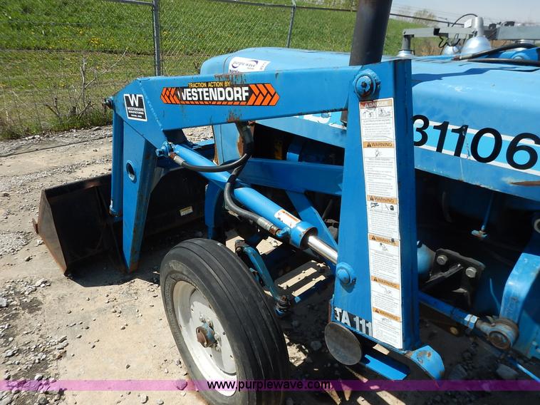 image for item J3974 1985 Ford 1910 tractor