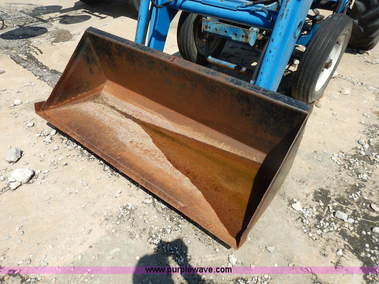 image for item J3974 1985 Ford 1910 tractor