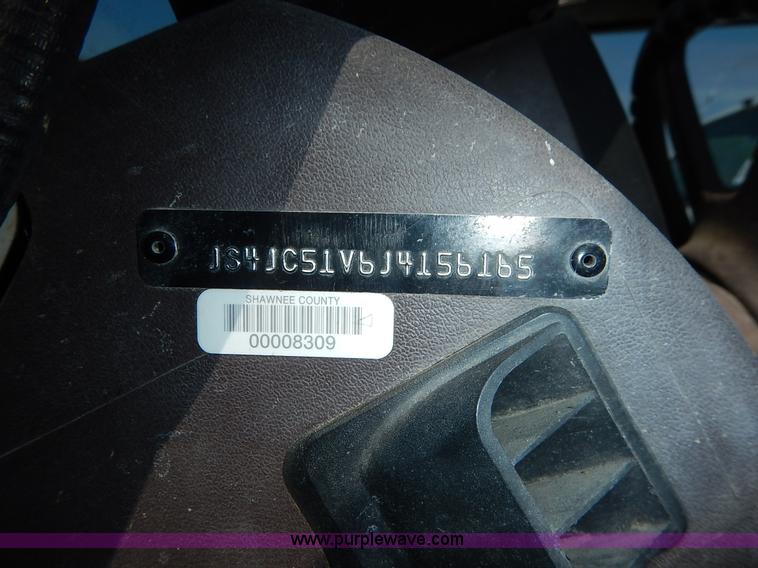 image for item J3977 1988 Suzuki Samurai Hezik SUV