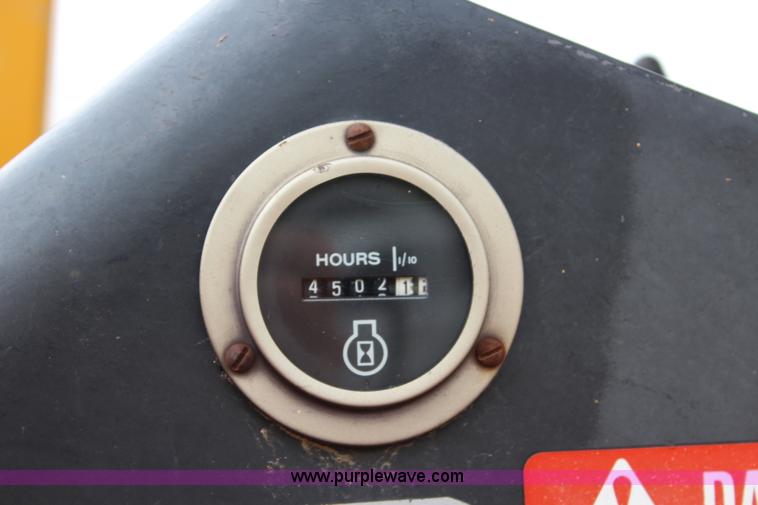 image for item J5898 1979 John Deere 310A backhoe