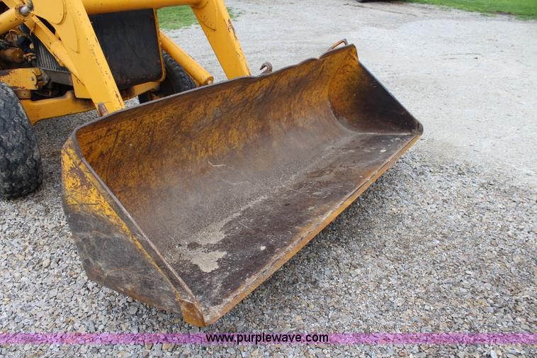 image for item J5898 1979 John Deere 310A backhoe