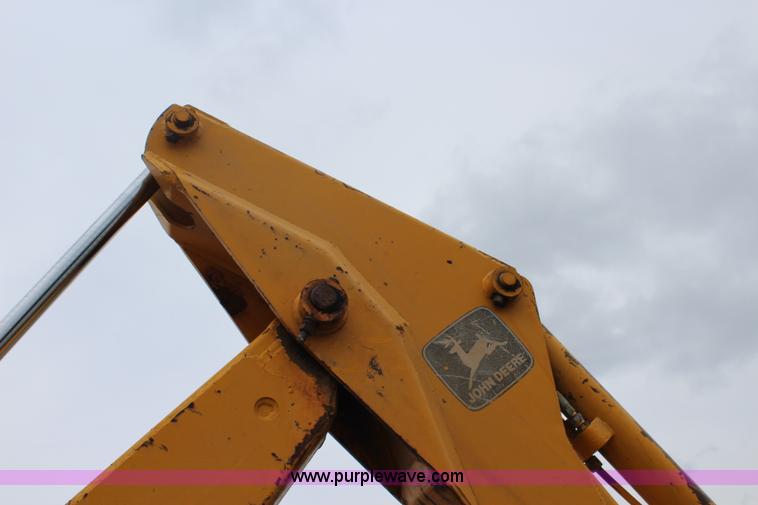 image for item J5898 1979 John Deere 310A backhoe