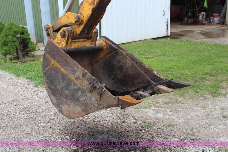 image for item J5898 1979 John Deere 310A backhoe